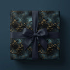 Elegant floral wrapping paper with dark blue ribbon and tree branch pattern.