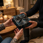 Giving a gift wrapped in Wrapped Studios floral wrapping paper with a gray ribbon.