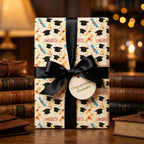 Congrats graduate wrapping paper with caps and black satin ribbon by Wrapped Studios.