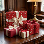 Luxury graduation gift wrap with red diploma pattern and cream ribbons by Wrapped Studios.
