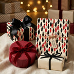 Graduation wrapping paper with black and red graduate pattern on gift boxes by Wrapped Studios.
