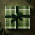 Green and white plaid gift wrapped with a velvet ribbon, perfect Christmas gift wrap.