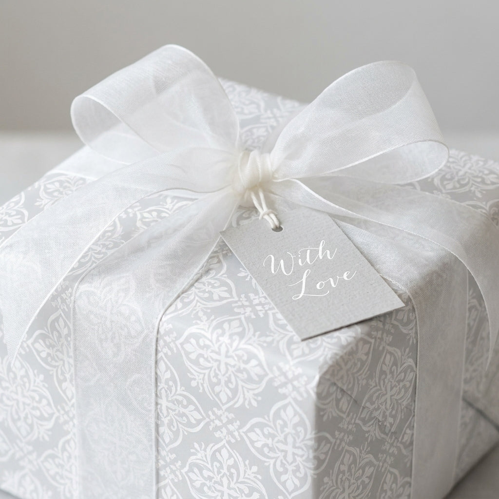 Elegant grey damask wedding wrapping paper with white ribbon and 'With Love' tag by Wrapped Studios.