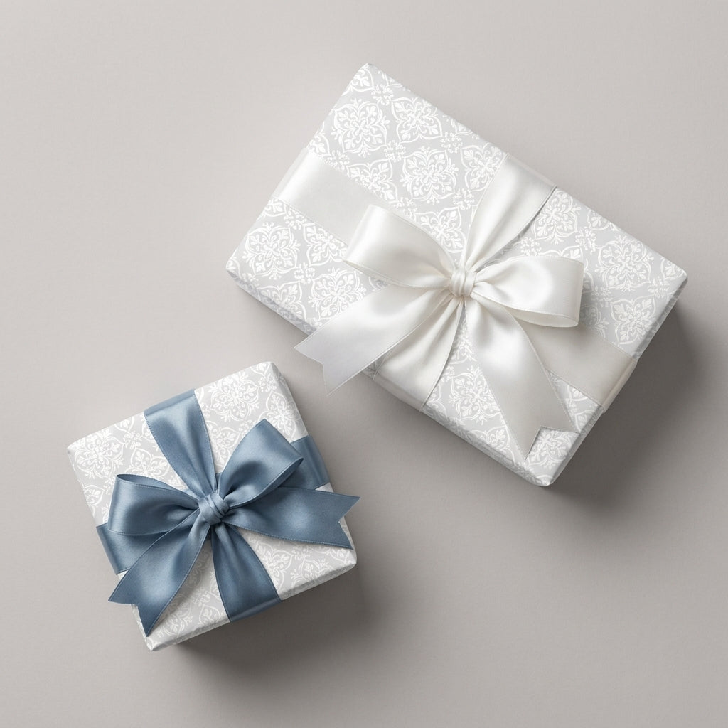 Elegant damask wedding wrapping paper with blue and white satin bows by Wrapped Studios.