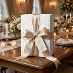 Elegant wedding wrapping paper with a white damask pattern and champagne satin ribbon by Wrapped Studios.