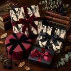 Gothic skull and crow wrapping paper with luxury velvet ribbons on gifts by Wrapped Studios.