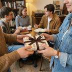 Friends exchanging a gift in chemistry science wrapping paper with a brown bow, by Wrapped Studios.