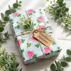 Cute watermelon heart wrapping paper on a gift box with rustic twine, summer gift wrap by Wrapped Studios.