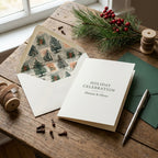 Elegant Christmas invitation with vintage tree envelope liner by Wrapped Studios.