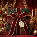 Elegant Christmas gifts wrapped in floral wrapping paper with velvet ribbon.