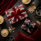 Retro movie wrapping paper by Wrapped Studios on gifts with red velvet bows, perfect for cinema lovers.