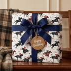 Equestrian horse racing birthday wrapping paper with navy blue bow and tag by Wrapped Studios.
