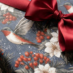 Vintage hummingbird Christmas gift wrap with red berries and a satin bow. Elegant holiday paper by Wrapped Studios.