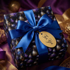 Luxury purple Christmas gift wrap with elegant gold ornaments and blue bow, by Wrapped Studios.