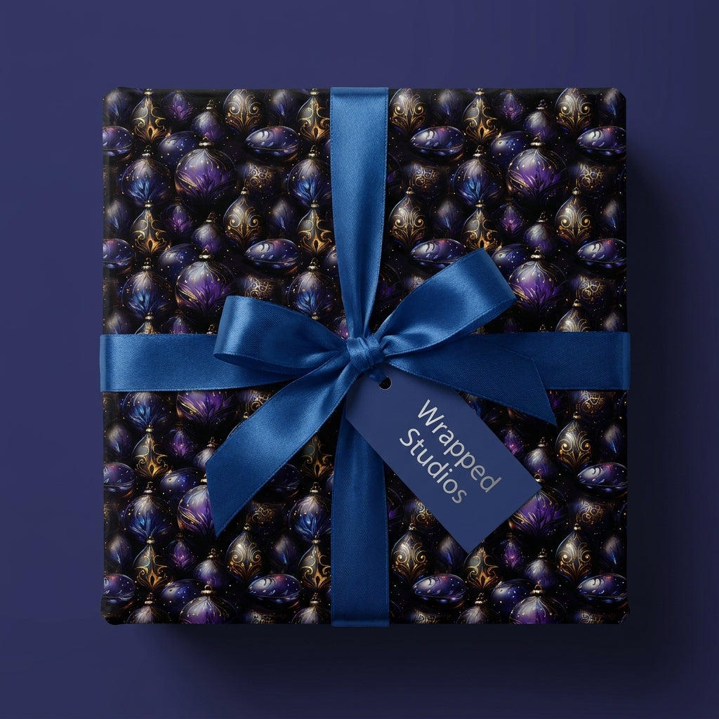 Luxury Christmas wrapping paper with a purple and gold ornament pattern and blue bow by Wrapped Studios.