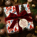Vintage Santa Christmas wrapping paper with a luxury red velvet bow by Wrapped Studios.