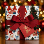 Vintage Santa Claus Christmas gift wrap by Wrapped Studios, tied with a red grosgrain ribbon and tag.