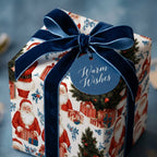 Vintage Santa wrapping paper with luxury navy velvet ribbon and Warm Wishes gift tag by Wrapped Studios.