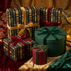 Luxurious holiday gifts wrapped in elegant floral wrapping paper with velvet ribbon.