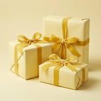 Elegant pale yellow gift boxes wrapped in matching velvet ribbon; luxurious gift wrap for weddings or birthdays.