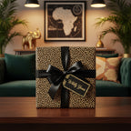 Chic gift box wrapped in leopard print wrapping paper with black ribbon and "Wildly Yours" tag.