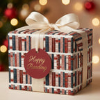 Book spine wrapping paper with cream satin bow and Happy Reading gift tag by Wrapped Studios.