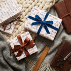 Cozy bookshelf gift wrapping paper with velvet ribbon, perfect for book lovers, by Wrapped Studios.