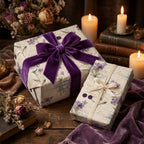 Elegant floral gift wrap with purple velvet ribbon. Perfect birthday wrapping paper or for special occasions.
