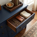 Vintage brown floral drawer liner paper in a navy blue dresser drawer by Wrapped Studios.