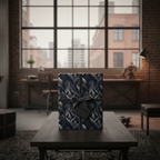 Elegant gift wrapped in navy floral wrapping paper with velvet ribbon, perfect for luxury gift presentation.