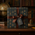 Elegant gift wrapped in beetle-patterned wrapping paper with brown ribbon, ideal for a curious collector.