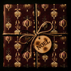 Elegant Christmas gift wrap with gold ornament pattern and twine bow.