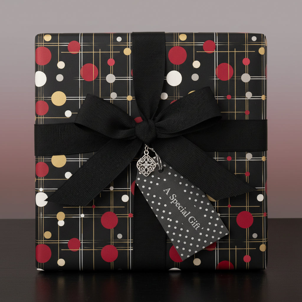 Elegant gift wrapped in black paper with a red, gold, and white dot pattern, tied with a black ribbon and "A Special Gift" tag.