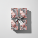 Luxury marble wrapping paper in pink, grey, and gold with a grey ribbon and gift tag, perfect for elegant gifts.