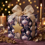 Elegant Christmas gift wrapped in festive purple ornament wrapping paper with a gold ribbon and "Noel" tag.