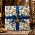 Luxury religious Christmas wrapping paper with Virgin Mary pattern and blue ribbon by Wrapped Studios.