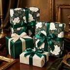 Luxury dark green floral wrapping paper with white roses and satin bows by Wrapped Studios.