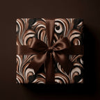 Luxury chocolate brown marbled wrapping paper with a satin bow by Wrapped Studios.