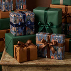 Luxury holiday gift wrap featuring whimsical vintage animal illustrations and satin ribbons by Wrapped Studios.