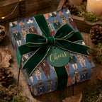 Whimsical deer Christmas wrapping paper with a green velvet bow on a holiday gift by Wrapped Studios.