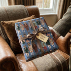 Blue stag illustration luxury gift wrap with herringbone ribbon and tag by Wrapped Studios.