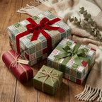 Rustic Christmas gift wrap in a green and red vintage patchwork pattern by Wrapped Studios.