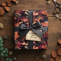 Rustic gift box wrapped in modern abstract print paper with a charcoal ribbon, perfect for any occasion.