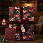 Elegant gift wrapped in artistic floral wrapping paper with a velvet ribbon, perfect Christmas present.