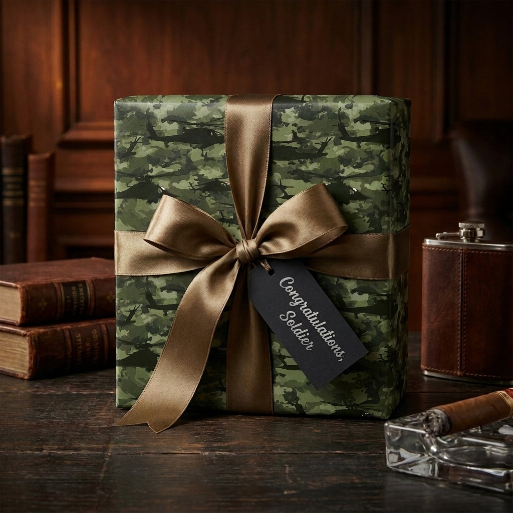 Camouflage military wrapping paper with helicopters, bronze bow, and soldier gift tag by Wrapped Studios.