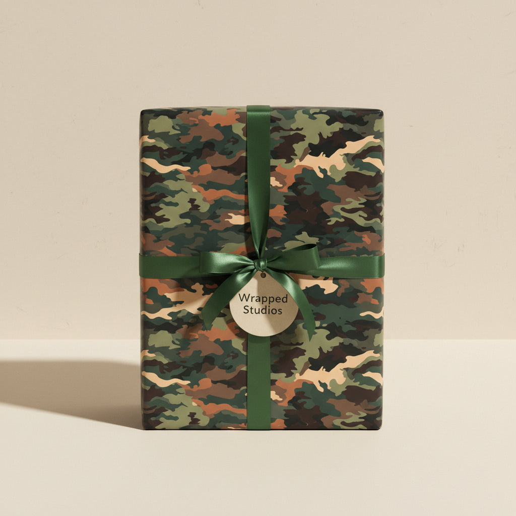 Gift wrapped in camouflage wrapping paper with a dark green satin ribbon and bow.