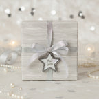 Elegant gift wrapped in silver & white wood grain paper with matching ribbon and "For You" star gift tag.