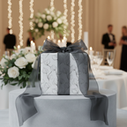 Elegant modern floral gift wrap in white and black with sheer gray ribbon, perfect for wedding, anniversary, or luxury special occasion.