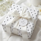 Elegant Christian cross baptism wrapping paper with white satin bow by Wrapped Studios.