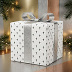 Christian cross wrapping paper with a silver bow for baptisms and holidays, by Wrapped Studios.